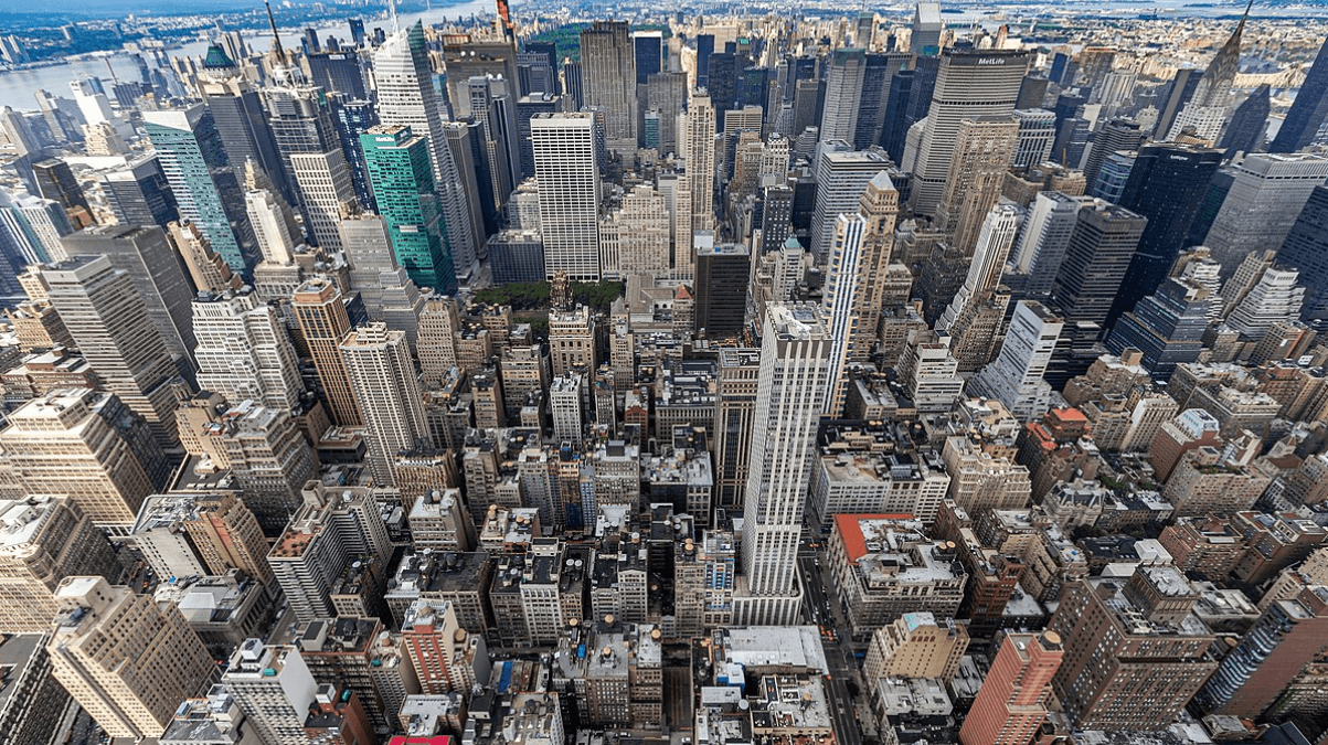 Como o Crescimento da Cidade Afeta o Valor dos Imóveis?